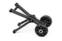 A black plastic wheelie bar assembly for an RC car, featuring two small wheels and a mounting frame, isolated on a white background.