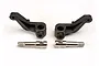 A pair of black plastic steering hubs and two silver metal wheel axles for a Traxxas RC vehicle.