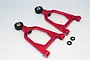 Two red anodized aluminium front upper suspension arms for an RC car, including two small black washers, set against a plain white background.