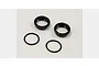 Two black metal shock adjustment dials and two black rubber O-rings for Kyosho RC cars.