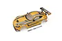 A pre-painted Kyosho 1/10 scale Mercedes AMG GT3 RC car body shell in metallic yellow with grey racing stripes and a rear wing, shown with a decal sheet.