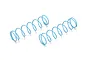 Two light blue coil springs for RC car shock absorbers, shown against a plain white background.