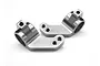 A pair of grey aluminium steering hubs for an RC car, shown from a high angle against a white background.