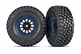 Two Traxxas RC wheels with BFGoodrich Baja KR3 tires mounted on black Method Racing rims with blue beadlock-style rings, isolated on a white background.