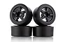 Two black RC drift wheels with five-spoke rims stacked against each other on a white background.