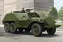 Box art illustration of a Soviet BTR-152K1 armored personnel carrier with a soldier in the hatch, set against a city street background.