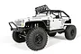 A white Axial SCX10 Jeep Wrangler G6 RC rock crawler kit, featuring a roll cage, off-road tires, and sponsor decals on a white background.