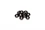 A small pile of ten black metal 3mm thin hex nuts arranged on a plain white background.