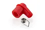 A red rubber spark plug cap and a small metal ignition coil spring for a 2-stroke RC engine.