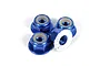 Four blue anodized aluminium flanged serrated nyloc nuts for RC vehicles, shown in a cluster on a white background.