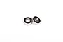 Two small metal ball bearings with black rubber seals sitting on a white background.