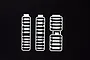 Three white plastic model kit sprues containing various small rectangular parts on a black background.