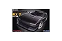 Product box art for a Fujimi 1/24 scale Mazda Savanna RX-7 FC3S plastic model kit featuring a black sports car illustration.