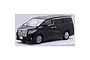 A studio shot of a black 1/24 scale Fujimi Toyota Alphard model car on a white background.