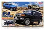 Fujimi 1/24 scale Toyota FJ Cruiser plastic model kit box featuring illustrations of the vehicle in blue, tan, and black on a rocky terrain background.