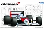 A digital illustration of the 1989 McLaren Honda MP4/5 Formula 1 car, shown in front of a schematic diagram of plastic model kit parts.