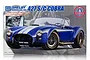 Product box art for a Fujimi Shelby Cobra 427 S/C plastic model kit featuring a blue Cobra with white racing stripes.