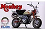 Product box art for a Fujimi 1/12 scale Honda Monkey model kit featuring a detailed illustration of the classic motorcycle.