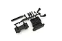 A black plastic Kyosho bulkhead set on a parts tree against a white background.