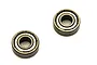 Two Kyosho metal shielded ball bearings shown against a plain white background.