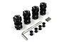A set of four black aluminium 17mm hex adaptors with 10mm offset, including nuts, pins, and an L-wrench, by Yeah Racing.