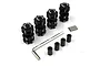 A set of four black Yeah Racing aluminium 17mm hex adaptors with 10mm offset, including wheel nuts, pins, and an L-shaped hex wrench.