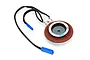 Traxxas sound output module speaker with a brown textured cone, metal frame, and black wires with blue connectors.