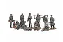 A set of painted 1/48 scale Tamiya WWII German infantry plastic model figures in various poses, including standing, sitting, and holding rifles and machine guns.