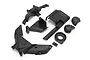 A set of black plastic RC car spare parts, including an upper cover, gear housing, and mounting components for a Kyosho Fazer chassis.