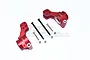 Two red anodized aluminium rear hub carriers for an RC car, accompanied by mounting hardware including screws and nuts, on a white background.