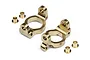 Two gold-coloured metal steering hub carriers for a 1/18 scale RC car, accompanied by four small brass bushings, set against a plain white background.