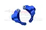 Two blue anodized aluminium rear hub carriers for an RC car, shown against a white background with a faint GPM Racing logo watermark.