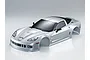 A silver painted 1/10 scale RC Corvette GT2 body shell shown from a high angle against a plain white background.