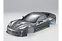 A silver-grey painted 1/10 scale RC car body shell modeled after a Corvette GT2, shown from a high-angle front three-quarter view.