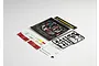 Killerbody 1/10 scale touring car engine accessory kit including a molded engine bay insert, plastic parts tree, decals, and mounting hardware.