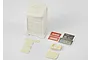 A 1/10 scale unpainted plastic model kit of an engine analyzer console with separate monitor, keyboard, and decal sheet.