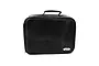 A black Yeah Racing transmitter carry case with a carbon fiber texture pattern and a small silver logo badge on the front.