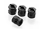 Four black aluminium RC wheel hex adapters arranged on a white background.