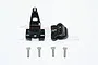 Two black aluminium RC car components and four silver screws on a white background.