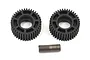 Two black plastic idler gears and one metal shaft for a Team Losi Racing RC car on a white background.