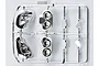 A chrome-plated plastic sprue containing light bucket components for a 1/10 scale RC Corvette GT2 model.