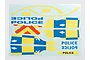 A sheet of Killerbody police car decals featuring blue and yellow checkered patterns, red chevron markings, and various Police text labels.