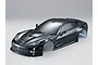 A glossy black 1/10 scale RC Corvette GT2 body shell, pre-painted with detailed headlights and decals on a plain white background.