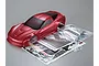 Killerbody 1/10 scale Corvette GT2 RC car body shell in iron oxide red, including decal sheet, instruction manual, and plastic accessory parts.