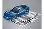 A metallic blue 1/10 scale Corvette GT2 RC car body shell with included decal sheet and instruction manual on a grey background.