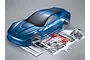Killerbody 1/7 scale metallic blue Corvette GT2 RC car body shell with included decal sheet and accessory parts on a grey background.