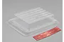 A clear plastic RC monster truck bed accessory with a strip of 3M VHB double-sided adhesive tape on a grey background.