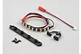 Killerbody accent light set including an LED strip, mounting brackets, and small screws on a light grey background.