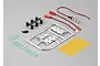 Killerbody 1/10 scale touring car number plate set with LED light unit, mounting hardware, and adhesive stickers on a grey background.