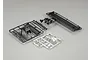 Killerbody Lancia LC2 plastic parts set on sprues, including black and chrome-plated components for RC car assembly.